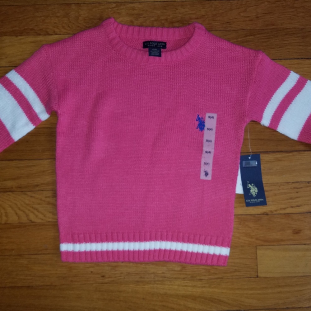 A brand new polo sweater in pink
